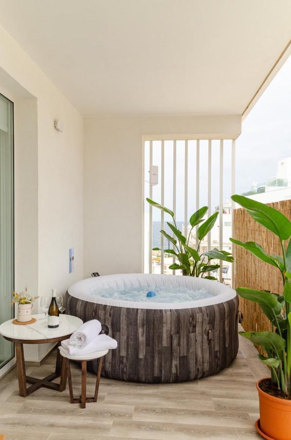 Apulialux Seaview Prestige Apt / Jacuzzi + Parking Appartamento Polignano a Mare Esterno foto